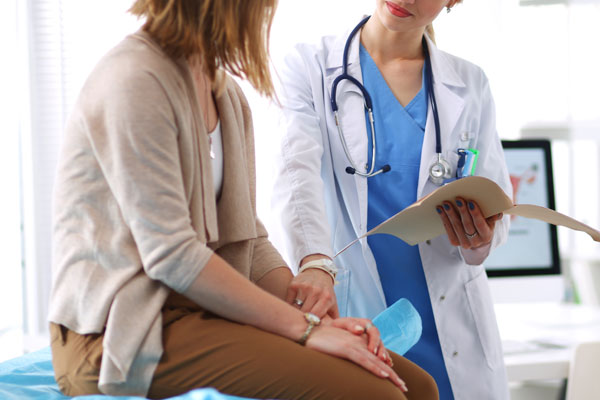 Lady having appointment with doctor